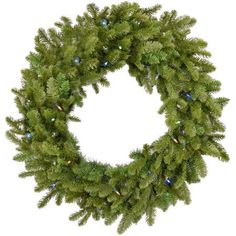 a christmas wreath with lights hanging from it