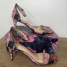 Pink/Black 3in Heels. Opened Toe With Single Strap Across Toes, Strap Around Ankles And Covered Heel. Similar To A Sandal With Heels. Brand New, In Box Never Worn/Used Size 8. Pink Heels With Ankle Strap, Pink Heels With Heel Strap And Medium Width, Elegant Ankle Strap Heels With Floral Print, Elegant Low Heel Floral Print Heels, Elegant Floral Print Heels With Ankle Strap, Elegant Low Heel Heels With Floral Print, Elegant Open Heel Floral Heels, Pink Low Heel Heels, Pink Party Sandals Medium Width