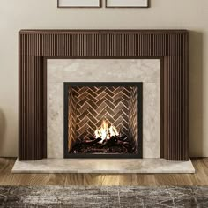 a fire place in a living room with two pictures on the wall and a fireplace