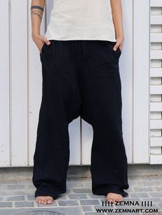 Unisex Alibaba Pants also known as Aladdin pants, Harem or Afgani trousers are very comfy. Unisex. Made from 100% soft khadi cotton with elasticated waist with drawstring. Light and Cozy, suitable for Indoor & Outdoor. No tie Tension with free size waist will give you a smooth and comfortable feeling whole day. Perfect wear for Yoga, Tai Chi and as daily outfit. Size:One fits Small to Medium Color: Black and Grey Wash Care: Hand Wash, cold water, do not soak Khadi is made without any synthet Afgani Trousers, Casual Harem Yoga Pants, Casual Harem Sweatpants For Summer, Casual Summer Harem Sweatpants, Comfortable Baggy Sweatpants For Summer, Casual Straight Leg Festival Pants, Casual Wide-leg Pants For Festivals, Casual Baggy Harem Parachute Pants, Casual Harem Yoga Pants With Pockets