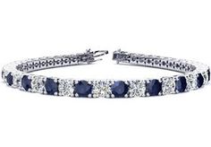 This classic gemstone bracelet features shimmering white diamonds in I-J color, I1-I2 clarity and sapphire gemstones. The 6 inch bracelet contains 39 gemstones and diamonds at 9.32 carats. The 6.5 inch bracelet contains 43 gemstones and diamonds at 10.28 carats. The 7 inch bracelet contains 46 gemstones and diamonds at 11.04 carats. The 7.5 inch bracelet contains 49 gemstones and diamonds at 11.72 carats. The 8 inch bracelet contains 53 gemstones and diamonds at 12.68 carats. The 8.5 inch bracel Black Diamond Bracelets, Black Diamond Bracelet, Tanzanite Bracelet, Mens Diamond Bracelet, Bracelets Black, Mens Tennis, Tanzanite Diamond, White Gold Bracelet, Tanzanite Gemstone