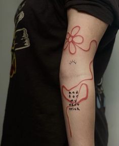 a person with a tattoo on their arm