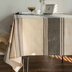 a table with a striped cloth on it