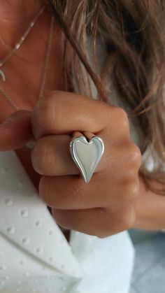 Sideways Heart Ring, Silver Heart Ring, Heart Ring, Love Ring, Gift for Girlfriend, Statement Ring, Heart Jewelry, Minimalist Ring 100% Handmade   100% Solid Sterling Silver  Width 21.0 mm  Length 16.0 mm Weight 16.0  grams (Weight may vary by size) Μade to order  Free shipping Tracking number  Elegant gift box and gift bag Accepted return for resizing  Acceptable return for repair  FOR MORE RINGS VISIT MY STORE https://www.etsy.com/shop/JEWELSinART?ref=seller-platform-mcnav§ion_id=25343190 Our Simple Heart Shaped Promise Ring, Simple Heart Midi Rings, Minimalist Heart Charm Ring For Valentine's Day, Heart-shaped Stackable Rings As A Gift, Personalized White Heart Ring, Valentine's Day Minimalist Heart Ring With Charm, Simple Heart Rings For Valentine's Day, Heart-shaped Sterling Silver Midi Rings, Simple Heart-shaped Rings For Valentine's Day