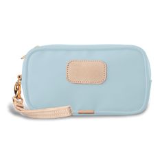 Fun and function in a compact package, the Wristlet is perfect for carrying anything and everything. It has plenty of room for large cell phones, key fobs, and sunnies. It features a fully lined interior with an open pocket and a zippered pocket. The natural leather wrist strap is fully detachable.