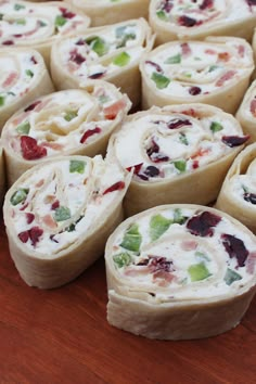 several rolls filled with different types of food