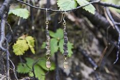 These earrings are: - made from pure Eco-friendly bronze (88% copper and 12% tin); - with sterling silver ear wires; - handcrafted. A family of three runs this shop - me, my mother and my step-father. We are kind, open-minded and experienced Latvian jewelry artists. We are not commercial and never will be. We stay unique and weird. We make our art and we're happy that we can share with it! For more cool jewelry designs click here: https://www.etsy.com/shop/WitchJewelryShop Like our shop? Follow Nature-inspired Silver Copper Earrings, Nature-inspired Copper Dangle Earrings, Hand Forged Dangle Earrings As Gift, Handmade Bronze Long Drop Jewelry, Silver Copper Wrap Earrings Gift, Bronze Long Drop Earrings For Gift, Hand Forged Brass Wrap Earrings As Gift, Handmade Brass Linear Earrings As Gift, Nature-inspired Bronze Earrings For Gifts