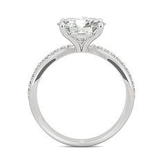 a white gold engagement ring with diamonds on the side