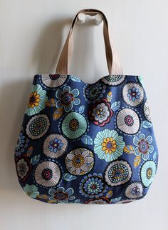 a blue purse hanging on the wall