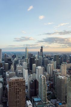 an aerial view of the city with skyscrapers and other high rise buildings in the foreground