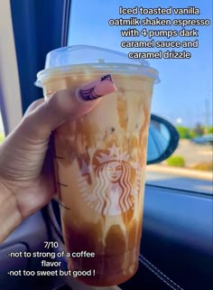 someone holding up a cup of coffee in their hand with the caption above it