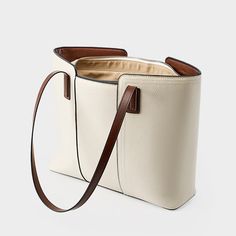 Gender: Women Type: Tote Bag Features: Adjustable Strap, Inner Pockets Main Materials: Cowhide Lining: Polyester Type of Closure: Zipper Style: Casual, Daily, Stylish Size: Length: 40 cm / 15.75 " Width: 28 cm / 11.02 " Height: 12 cm / 4.72 " Beige Faux Leather Hobo Bag With Large Capacity, Beige Large Capacity Faux Leather Hobo Bag, Large Capacity Beige Faux Leather Hobo Bag, Casual Cream Leather Shoulder Bag, Beige Faux Leather Hobo Shoulder Bag, Beige Faux Leather Shoulder Bag For Office, Beige Large Capacity Faux Leather Bucket Bag, Large Capacity Beige Faux Leather Bucket Bag, Versatile Cream Leather Shoulder Bag