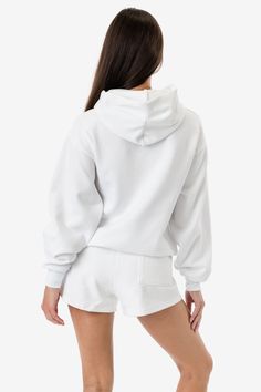 Our new mid-weight, 2-end fleece is made of a 50/50 blend of poly cotton and has a tight knit with minimal stretch. This 10 oz. fleece is an easy, versatile year-round textile. This oversized hoodie has a wide, voluminous fit and features a kangaroo pocket and matching rib cuffs and waistband. This mid-weight fleece is easy to layer in the spring and summer and is an ideal textile for active wear. Made in Los Angeles, Calif. Our experienced sewers earn up to $25 an hour and no less than $16; add Cozy Fit Sweats With Adjustable Hood For Loungewear, Cozy Stretch Sweatshirt With Drawstring Hood, Cozy Fit Sweatshirt With Adjustable Hood For Loungewear, Adjustable Hood French Terry Sweats For Loungewear, French Terry Sweats With Adjustable Hood For Loungewear, Fleece Hoodie With Ribbed Cuffs For Workout, Hooded Fleece Sweats For Workout, Comfortable Solid Sweats With Drawstring Hood, Comfortable Hooded Sweatshirt For Workout