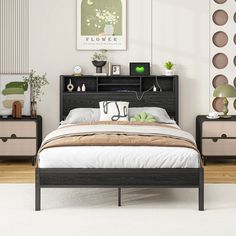 a bedroom with a bed, two nightstands and pictures on the wall above it