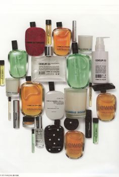 many different types of perfumes are arranged together