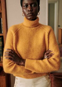 CROP super kid mohair and merino wool jumper with long sleeves;Cable knit detail on the raglan sleeve;Rolled high neck;Length from the shoulder: 45 cm / 17.7 in (for a S) Yellow Sweater Outfit, Classic Essence, Apricot Clothing, Girl Essentials, Crop Pullover, Thrift Inspo, Merino Sweater, Parisian Apartment, Ageless Style