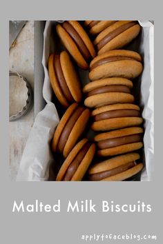 a box filled with lots of different kinds of cookies