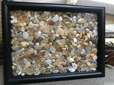 a black frame filled with lots of rocks