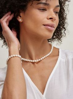 A classic strand of pearls with matching stud earrings is more than just a welcomed addition to your jewelry box  its a veritable staple to be cherished for a lifetime. Our Freshwater Pearl Necklace and earrings set features stunning white round pearls, with a discreet and luminous luster that is suitable both for your daytime and night-time outfits.

Customize your pearl set with the desired necklace length, pearl quality, clasp and earring backing type for a unique, personalized gift, ideal Classic Pearl White Pearl Jewelry, Classic Pearl White Jewelry, Classic Pearl Drop Jewelry, Classic Pearl White Jewelry With Pearl Charm, Classic Pearl Jewelry For Anniversary, Elegant Hypoallergenic Jewelry With Round Beads, Classic Pearl Jewelry With Round Beads, Classic Round Pearl Bead Jewelry, Classic Pearl White Round Jewelry