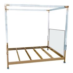 a metal bed frame with a mirror on the bottom and side rails above it, against a white background