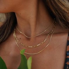 This Paperclip Chain Layered Necklace in 18k gold-filled epitomizes trendy elegance. Its distinct paperclip design offers a modern and stylish layered look, perfect for adding a fashionable edge to any outfit. Chain Necklace Outfit, Gold Paperclip Necklace, Chain Layered Necklace, Paper Clip Chain Necklace, Triple Layer Necklace, Paperclip Necklace, Necklace Stack, Necklace Outfit, 18k Gold Necklace