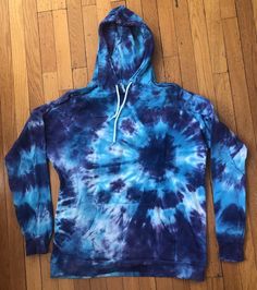 Tie-dye adult hoodie sweatshirt, pullover, kangaroo pocket, drawstring on hood. Hand-dyed. 100% cotton. Machine washable. These are 2X, but they run small. Each picture represents a different item; please specify which one you want. If you want a color or size I don't have here, let me know and I'll custom-make one for you! Also, hoodies with a zipper available on a custom-order basis for an additional cost. Blue Soft-washed Hooded Sweatshirt, Acid Wash Hoodie With Drawstring Hood And Crew Neck, Acid Wash Hoodie Sweatshirt With Drawstring, Acid Wash Long Sleeve Hoodie With Drawstring, Acid Wash Sweatshirt With Drawstring Hood And Long Sleeves, Casual Acid Wash Sweatshirt With Kangaroo Pocket, Blue Soft-washed Hoodie Sweatshirt, Acid Wash Hoodie With Kangaroo Pocket And Long Sleeves, Acid Wash Hoodie With Kangaroo Pocket