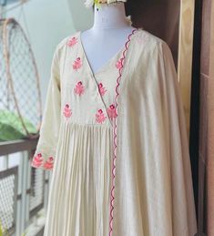 embroidered chanderi cream color Kurta with  dupatta /cream anarkali kurta suit set /white  kurta set dupatta USA/cream kurta with dupatta / Indian dresses/ voggish /white anarkali dress         Looking for a perfect indian dress/anarkali/suit sets that are trendy, unique and easy to carry !! yess, You are at the right place. we carry such versatile pieces of anarkalis and suit sets that really let you stand out in any occassion !!      featuring this beautiful mul chanderi silk embroidered Kurta in beautiful cream color with pink embroidery highlights and V neck and full sleeves paired matching embroidered soft chanderi scallop dupatta as shown !! A very classy, beautiful look makes your occasion Perfect !! Ready to ship !!  Details :  - color : pure handloom mul chanderi embroidered with Cotton Silk Anarkali Set With Embroidered Border, Off White Anarkali Set With Embroidered Border, Cream Chanderi Palazzo Set With Resham Embroidery, Cream Gota Work Dress For Diwali, Cream Straight Kurta Anarkali Set In Chanderi, Semi-stitched Cream Chanderi Palazzo Set, Cream Chanderi Anarkali Set With Resham Embroidery, Cream Chanderi Anarkali Set With Straight Kurta, Cream Palazzo Set With Straight Kurta For Festivals