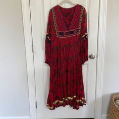 Questions? Leave A Comment Below! Festive Red Long Sleeve Maxi Dress, Red Long Sleeve Bohemian Maxi Dress, Bohemian Long Sleeve Red Dress, Bohemian Red Long Sleeve Dress, Red Folk Style V-neck Dress, Red Folk Dress With Floral Print, Red Folk Style Floral Print Dress, Red Embroidered Maxi Dress For Festival, Red Long Embroidered Dress