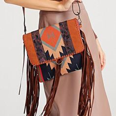 Unleash Your Bohemian Spirit Discover the perfect blend of style, comfort, and bohemian flair with our Vintage Boho Tassel Shoulder Bag. Exquisitely crafted with a vibrant patchwork of canvas and PU leather, this bag is not just an accessory but a statement of your unique style. Whether you're navigating the urban jungle or exploring quaint cobblestone streets, this bag is your ideal companion. Detailed Craftsmanship Originating from the skilled artisans of GUANG DONG Province, each bag showcase Bohemian Multicolor Bags For Fall, Bohemian Multicolor Fall Bags, Brown Bohemian Satchel With Fringe, Bohemian Brown Bags For Fall, Bohemian Brown Fringe Satchel, Brown Bohemian Fringe Satchel, Bohemian Brown Shoulder Bag With Leather Handles, Bohemian Fall Bags With Tassels, Bohemian Shoulder Bag For Fall