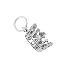 a silver crown charm on a white background