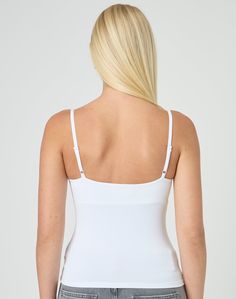 The latest crossover cami top is now here in our supersoft fabric featuring spaghetti straps and flattering fit. Bra-friendly Scoop Neck Elastane Camisole, Scoop Neck Camisole With Built-in Bra, Versatile Stretch Tops With Straps, White Elastane Camisole Tank Top, White Elastane Tank Top, White Elastane Cami Top, White Elastane Camisole Top, Scoop Neck Elastane Camisole With Adjustable Straps, Versatile Seamless Cami Top