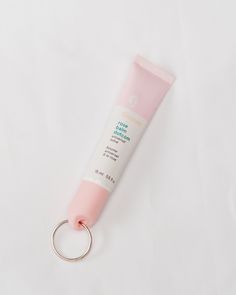 Reusable keychain cap for Glossier lip balm brand. Fits just like the original cap. Perfect fit! This cap will last you forever due to its durability and with it being a keychain, it is so much easier to keep track of! (This cap fits the updated new tube) *Chapstick not included *Keyring included