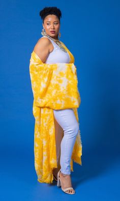 Experience the vibrant energy of summer with our Yellow Tie Dye kimono! Made with breathable fabric, this one-size-fits-most piece is perfect for any occasion. Versatile and comfortable, it's your go-to for effortless style all season long. One Size Long Cover-up For Day Out, Summer Wrap Cover-up Free Size, Free Size Kaftan For Spring Beach Cover-up, Cotton Open Front Cover-up For Day Out, Oversized Open Front Cover-up For Loungewear, Oversized Robe With Kimono Sleeves For Beach Cover-up, Cotton Tunic Kimono For Spring, Spring Wrap Robe For Beach Cover-up, Spring Cotton Tunic Kimono