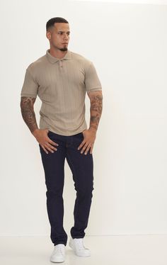 The Fine Ribbed Polo Shirt offers a perfect blend of casual comfort and refined style. Crafted from a soft and breathable fabric with a fine ribbed texture, this shirt provides a luxurious feel against the skin while allowing for optimal airflow to keep you cool and comfortable. Its classic polo collar adds a touch of sophistication, making it suitable for a variety of occasions, from casual outings to more formal events. The ribbed design adds subtle visual interest and texture to the shirt, enhancing its overall appeal. With a tailored fit that flatters the silhouette, this polo shirt offers a polished look without sacrificing comfort. Available in a range of versatile colors, the Fine Ribbed Polo Shirt can easily be dressed up or down to suit your personal style. Pair it with chinos or Ribbed Collared Top With Relaxed Fit, Ribbed Cotton Polo Collar Top, Collared Ribbed Top For Business Casual, Ribbed Collared Top For Business Casual, Casual Beige Polo Shirt With Ribbed Collar, Beige Relaxed Fit Top For Business Casual, Casual Tops With Ribbed Collar For Business Casual, Casual Tops With Ribbed Collar For Business, Classic Ribbed Tops For Business Casual