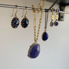 Deep royal blue and opulent gold make a perfect match in these lithe triple drops. 18k & 14k green gold Lapis lazuli Circles are graduated in size from 6mm (1/4") in diameter to 8mm (5/16") diameter Earrings hang 1 1/16" from the ear Elegant Blue Jewelry With Bezel Setting, Classic Brass Jewelry With Cabochon, Yellow Gold Cabochon Drop Earrings, Yellow Gold Teardrop Jewelry With Bezel Setting, Timeless Teardrop Bezel Set Jewelry, Timeless Tanzanite Yellow Gold Jewelry, Elegant Round Royal Blue Jewelry, Elegant Royal Blue Round Jewelry, Luxury Royal Blue Jewelry