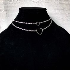 💌JOIN OUR EMAIL LIST FOR 20% OFF COUPON💌 Sign up here: http://eepurl.com/hVBecv (You will receive exclusive deals, information on upcoming releases/giveaways and much more! Check spam folder if you cannot find email containing instant coupon code.) Something more delicate but don't let this necklaces look fool you. She's extremely strong and beautiful. Choose either a smaller heart or large in the drop down menu. An instant staple piece for sure. Entirely 100% stainless steel down to the compo Silver Heart Necklace With Chain For Mother's Day, Mother's Day Silver Heart Necklace With Chain, Mother's Day Silver Heart Necklace, Nickel-free Heart Shaped Alloy Jewelry, Nickel-free Heart-shaped Alloy Jewelry, Trendy Metal Jewelry For Valentine's Day, Trendy Open Heart Metal Jewelry, Trendy Double Heart Sterling Silver Jewelry, Trendy Sterling Silver Double Heart Jewelry