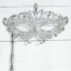 Durable Quality: This Crystal Masquerade Mask With Metal Stick Is Made Of High-Quality Alloy And Rhinestone, Diamond. They Are Manual Workmanship, Very Comfortable To Wear. Elegant Design: The Masquerade Mask Is Encrusted Shinny Diamond Rhinestone And Crystal. The Intricate And Delicate Are Very Glamorous, Elegant And Luxury. Princess Style: You Will Be The Center Of Attraction At Party When You Wear The Princess Style Fancy Mask. Various Occasion: The Masks Are Perfect For Masquerade Party, Fes Hand Held Masquerade Mask, Silver Masks Masquerade, Masquerade Mask With Stick, Mask Prom, Fancy Mask, Silver Masquerade Mask, Prom Gloves, Crystal Mask, Masquerade Prom