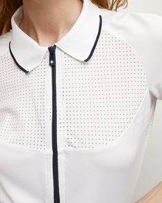 A classic polo, with a high-performance edge. Featuring curved seams, 4-way stretch piqué and breathable mesh at the yoke, this quarter-zip top offers superior flexibility and comfort. Style with a miniskirt and sneakers for everyday chic.Part of our tennis capsule in collaboration with activewear brand L’Etoile Sport.100% PolyamideMesh: 73% Nylon, 27% ElastaneMachine wash coldStyle #T070