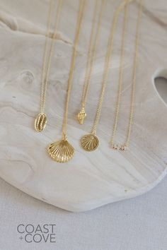 This beautiful Gold Sanibel Necklace is crafted from 14k gold vermeil and shaped like a flat scallop shell. Our gold jewelry pieces are durable and made to layer and stack. Style this as a simple everyday necklace, or layer it in a gold necklace stack. However you style it, this piece is a timeless reminder of the beauty of the ocean. Elegant Shell-shaped Charm Necklaces For Beach, Elegant Shell Pendant As A Gift, Elegant Shell Pendant As Gift, Elegant Shell Pendant For Gift, Elegant Yellow Gold Shell Necklace, Elegant Pendant Charm Necklaces For The Beach, Elegant Beach Pendant Charm Necklaces, Elegant Beach Pendant Charm Necklace, Elegant Gold Shell Necklace For Beach