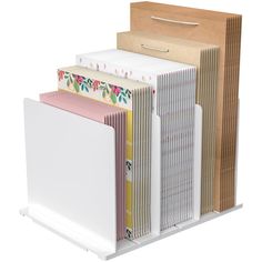 several file folders stacked on top of each other in front of a white background