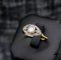 * Metal: 14k Yellow Gold * Weight: 2.9 grams * Ring Size: 9.25 *Experience elegance and timeless beauty with this 14k yellow and white gold 0.45 CTW diamond ring showcasing a vintage Art Nouveau raised setting. Perfect for the modern romantic, this stunning piece exudes class and sophistication, adding a hint of sophistication to any ensemble. Classic Round Cut Diamond Ring Stamped 14k, Timeless 14k Gold Cluster Anniversary Ring, Classic Round Cut Diamond Ring, Classic 14k Stamped Promise Diamond Ring, Timeless 14k Gold Cluster Ring For Anniversary, Fine Jewelry 14k Gold Diamond Ring, Collectible Yellow Gold Rings With Diamond Accents, Yellow Gold Art Deco Diamond Ring With Brilliant Cut, Timeless 14k Diamond Ring