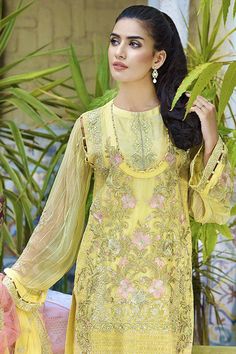 Beautiful Crinkle chiffon dress for party wear. Yellow color dress is embellished with thread embroidered crinkle chiffon shirt.Over all dress is embellished with multi color thread embroidery by giving a lavish look to outfit. Trouser: Pakistani crinkle chiffon dress is paired with raw silk trouser in matching color embellished with embroidered patches. Dupatta: Embroidered crinkle chiffon dupatta is fully embellished with thread embroidery and side embroidered borders. Detailed Description: SK Yellow Color Dress, Cream Color Dress, Navy Blue Shirt, Dress For Party, Wedding Party Wear, Navy Blue Shirts, Long Cut, Pakistani Bridal Wear, Silk Trousers