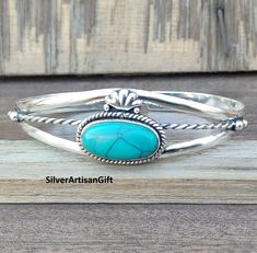 Turquoise is a mineral that is associated with the heart, throat, and third eye chakras. It is the birthstone for December and is associated with the zodiac signs Scorpio, Sagittarius, Aquarius, and Pisces. stone - Turquoise  material - 925 sterling silver  stone shape- -oval setting-  Bezel This is classy fine hand-crafted sturdy- Turquoise bangle . Turquoise Bangle, Aquarius And Pisces, Sagittarius Aquarius, Zodiac Signs Scorpio, Oval Setting, Gemstone Bangle, The Zodiac Signs, Scorpio Sagittarius, December Birthstone