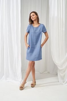 "A classic, fitted design shirt dress that is super comfy and stylish at the same time. Tailored with short sleeves, made from Lithuanian washed linen fabric. Feels silky soft on the skin and is a nice item to pair with both sandals and sneakers. FABRIC: 100% Softened Lithuanian Linen COLOR: Please choose the desired color from the side menu. STYLE: Loose linen T-shirt dress with short sleeves, fold at the back, and side pockets. SIZE CHART: 2 US/ 6 AU/ 34 EU: Bust 31.5\" (80 cm) , Waist 23\" (5 Relaxed Fit Short Sleeve Dress, Short Sleeve Linen Dress For Summer Workwear, Fitted Dress With Rolled Short Sleeves, Short Sleeve Linen Dress For Workwear, Knee-length Daywear Dresses With Rolled Sleeves, Relaxed Fit Short Sleeve Work Dresses, Short Sleeve Linen Dress With Pockets For Work, Fitted Short Sleeve Linen Dress For Work, Fitted Short Sleeve Dress With Rolled Sleeves