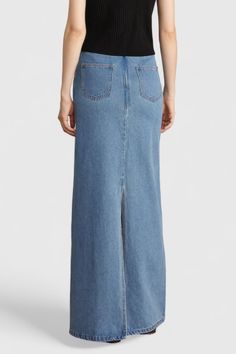 This Maxi Denim Skirt is crafted with a cropped waistband for a fashionable edge, and featuring pockets, a zipper closure, and a straight fit.Fabric: Cotton, Polyester Maxi Denim Skirt, Long Jean Skirt, Romper Swimsuit, Hot Jumpsuits, Boho Summer Dresses, Swimsuits Hot, Denim Maxi Skirt, Babydoll Lingerie, Swimwear Cover