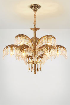 a chandelier hanging from the ceiling in a room