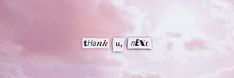 two pieces of paper that say thank u next to each other in front of a cloudy sky