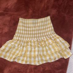 Yellow And White Checkered Mini Skirt, Tight At The Waist (But Elastic So It’s Stretchy) Flows Out At The Bottom Casual Yellow Bottoms For Brunch, Cute Yellow Skirt For Spring, Casual Fitted Yellow Mini Skirt, Yellow Skirted Summer Bottoms, Casual Yellow Mini Skirt For Spring, Yellow Mini Skirt Bottoms For Summer, Casual Yellow Skirted Bottoms, Yellow Mini Skirt For Vacation, Cute Fitted Yellow Bottoms