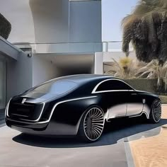 a futuristic car is parked in front of a modern house with palm trees behind it