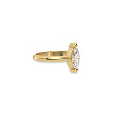 This ring features a marquise solitaire diamond elegantly secured in a two v-prong setting on a solid gold band for a classic and timeless look.Details: - Made to Order- Diamond Weight: 1.00 CT, 1.25 CT, 1.50 CT, 1.75 CT, 2.00 CT, 2.25 CT, 2.50 CT, 2.75 CT, 3.00 CT- No of Diamonds: 1- Diamond Type: Lab Grown Diamond (CVD, HPHT)- Diamond Cut: Marquise- Diamond Clarity: VS - Diamond Color: Colorless (DEF)- Setting Type: Prong- Band Thickness: 1.10 MM- Band Width: 1.50 MM- Metal Type: 14K Solid Gol Luxury Marquise Ring With Vs Clarity, Classic Marquise Rings With Vs Clarity, Marquise Lab Grown Diamond Ring With Vvs Clarity, Marquise Lab-grown Diamond Ring With Vvs Clarity, Timeless Rings With Tension Setting And Lab-grown Diamond, Marquise Cut Cluster Ring With Vs Clarity, Timeless Rings With Tension Setting And Lab Grown Diamond, Marquise Cut Lab Grown Diamond Ring Vs Clarity, Vs Clarity Marquise Cut Lab Grown Diamond Rings